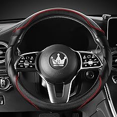 Steering wheel with emblem in a car interior