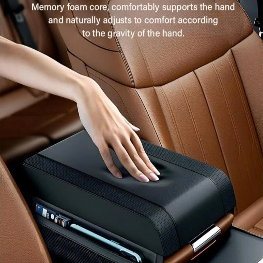 Hand resting on a car armrest console with text about memory foam support.