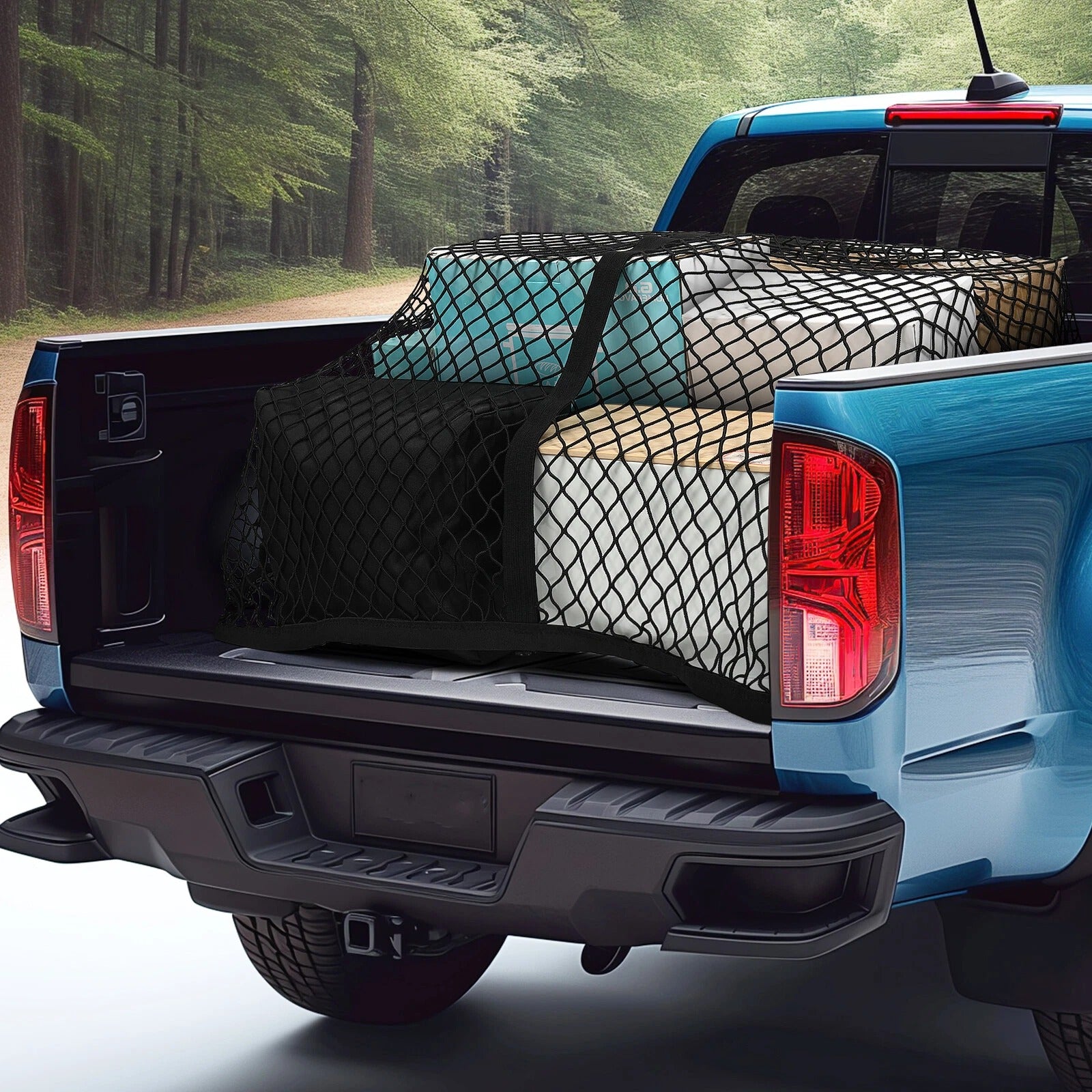 Blue truck with a cargo net in the back, surrounded by trees.